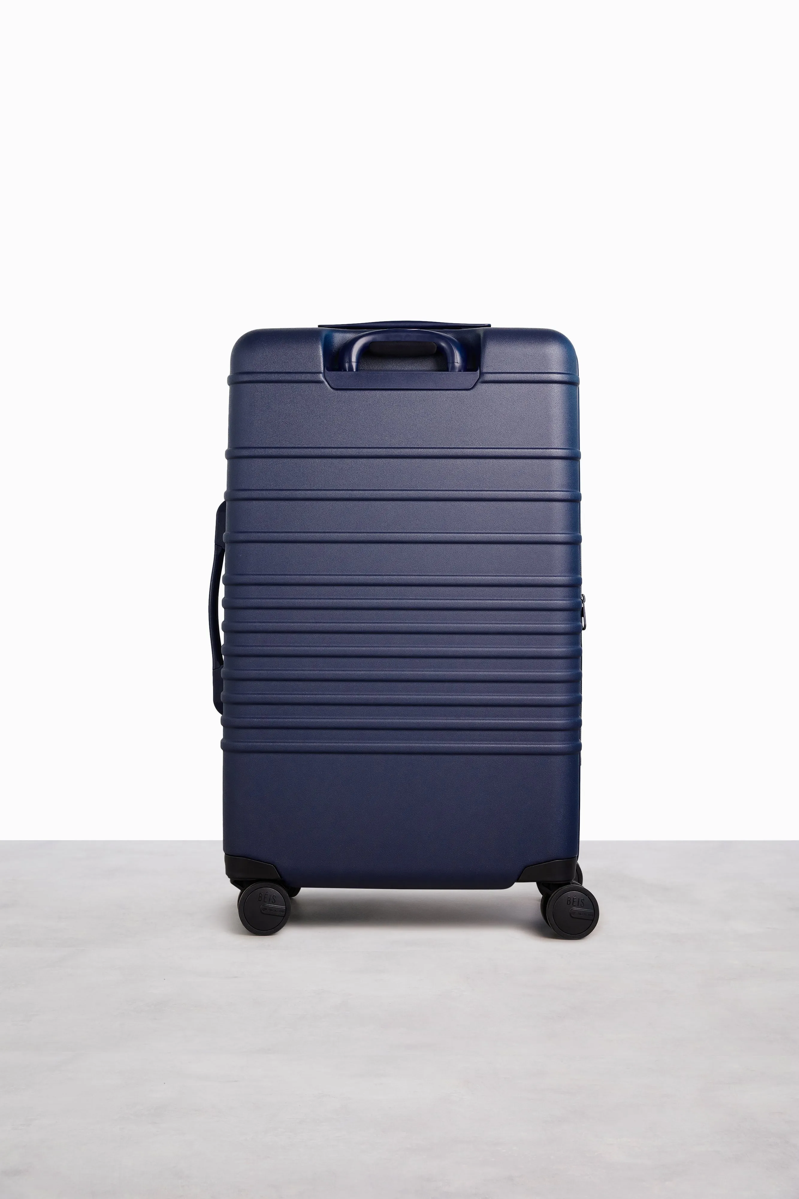 The Medium Check-In Roller in Navy